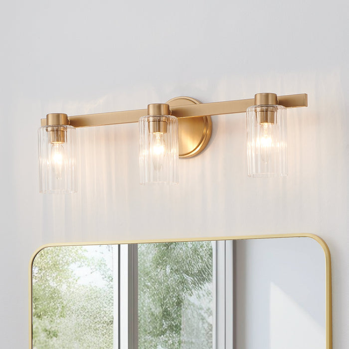 Bedminster 24-inch 3-light Champagne Gold Vanity Light with Clear Ribbed Glass Shades