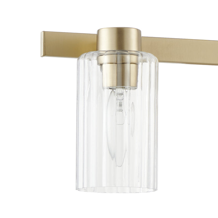 Bedminster 24-inch 3-light Champagne Gold Vanity Light with Clear Ribbed Glass Shades