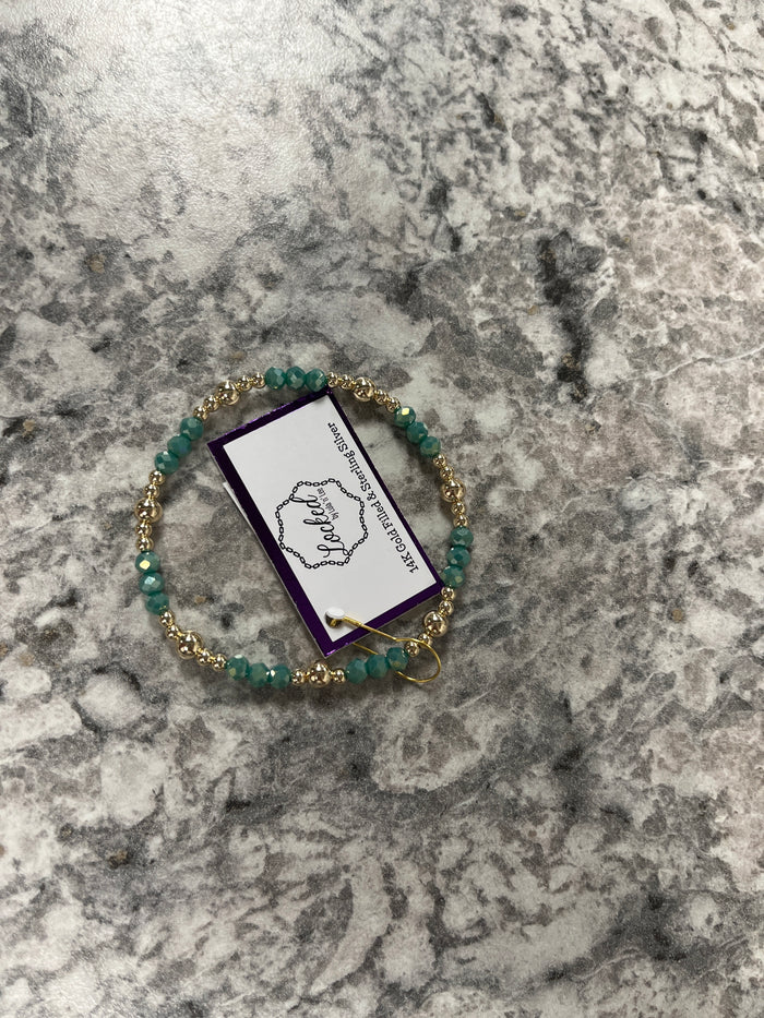 Classic gold with evergreen crystals