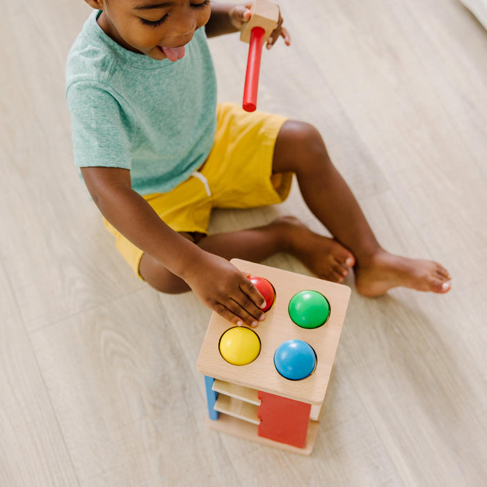 Melissa & Doug Deluxe Pound and Roll Wooden Tower Toy with Hammer, White