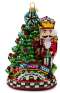 Nutcracker By Tree Glass Ornament