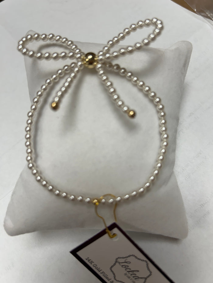 Pearl Bow Bracelet with Gold Accents